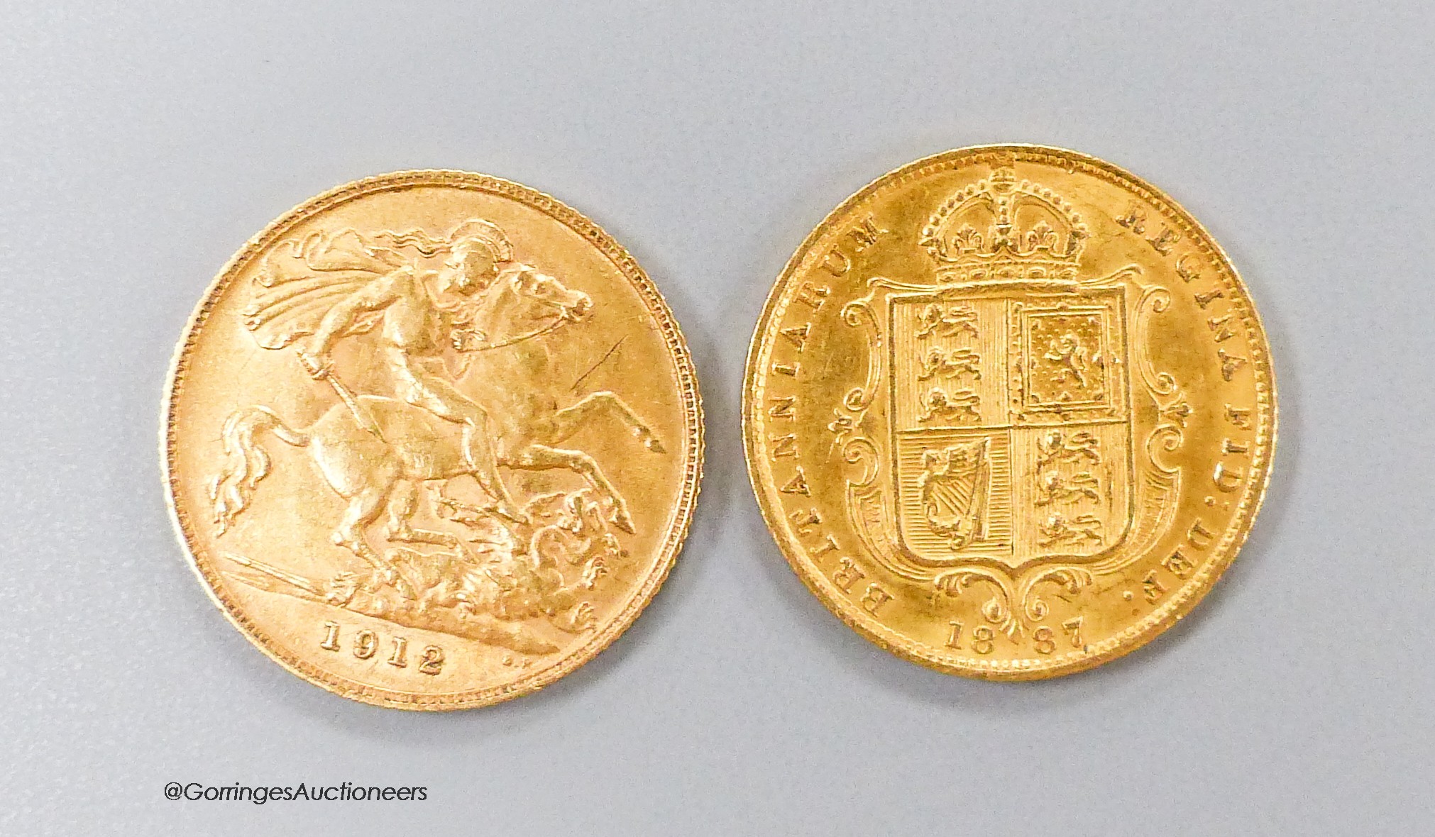A Victoria gold half sovereign, 1887 and a George V 1912 gold half sovereign.